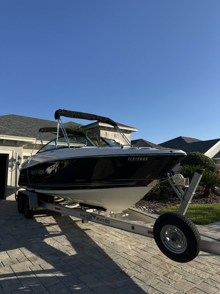 Freshly detailed black Monterey bowrider